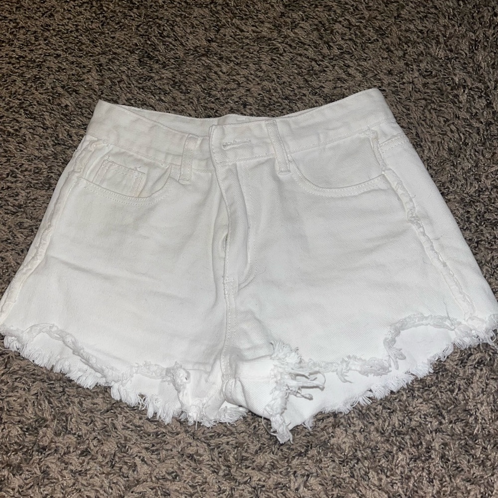These are cute white jean shorts, not see through.
